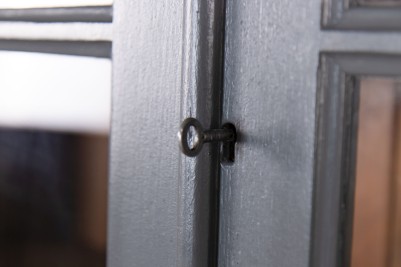 door-and-silver-key-close-up